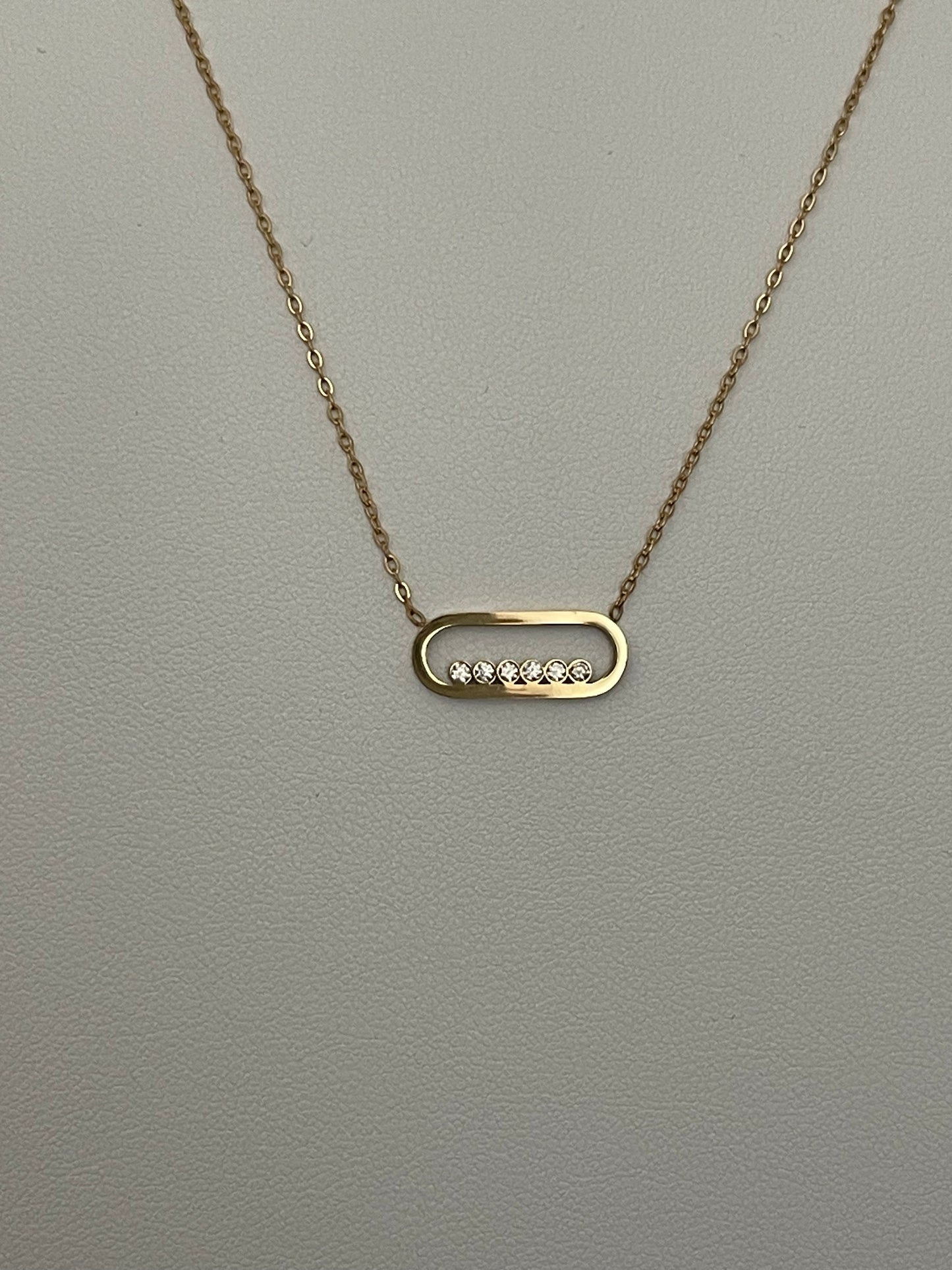 Ensemble collier et bracelet doré maille ovale sertie de brillants