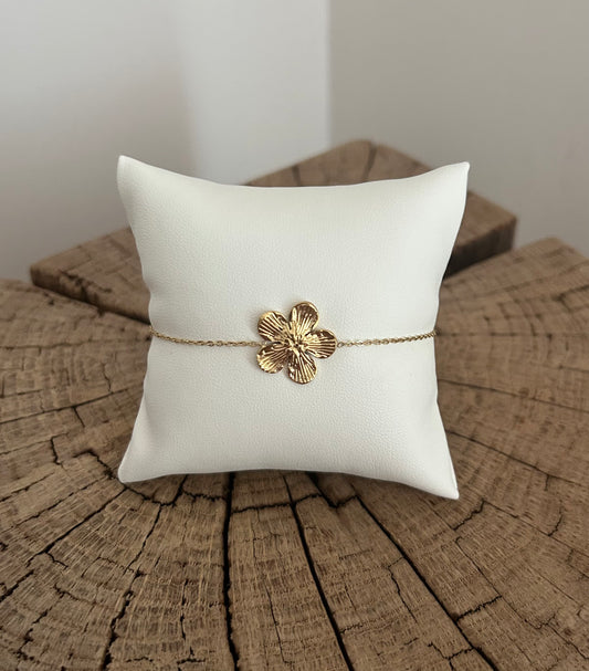 Bracelet fin doré avec jolie fleur